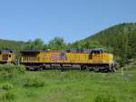 Union Pacific 6063 leads a loaded coal train down the hill near Rollinsville, Colorado on 1 July 2005.