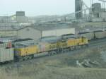 A pair of UP dieselloks pulls an empty train onto the staging track at the Thunder Basin Coal Company near Wright, Wyoming on 10 Nov 2003.