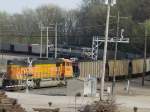 BNSF 9895 pushes a loaded coal train onto the  K line  which follows the Mississippi River for the next 5 miles.