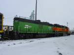 BNSF 2351 in Heritage I paint scheme is coupled to a rarely seen cabless Burlington Northern unit number 1701 at the yard in its namesake, Burlington, Iowa.