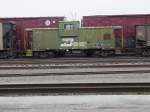 Burlington Northern caboose 10781 sits in the yard at Burlington, Iowa on 27 Feb 2006.