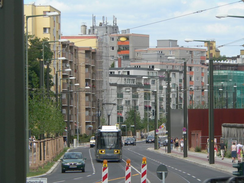 Tram in Berlin - in Background you see the  Mauergedenksttte  with a piece of the Berlin Wall. 2008
