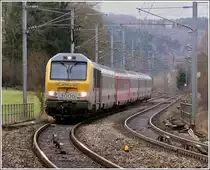 3006 is hauling the IR 115 Liers - Luxembourg City through Wilwerwiltz on December 11th, 2007.