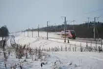 Thalys Paris-Cologne into powder snow in Gr�nhaut forest (January 2010), some days after the first Thalys units had been allowed to run on the new high speed track (Ch�n�e-Walhorn).