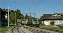 A MOB fast train service to Montreux is arriving at Sch�nried. 
23.09.2011 