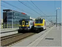 AM City Rail 988 and M 6 control car are meeting in Antwerpen-Luchtbal on June 23rd, 2010.