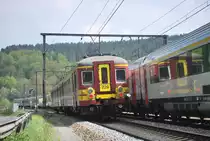 IR-q train to Aachen (D) is passing IC-A Eupen-Ostend near Goffontaine in May 2010.
