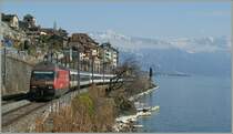 The SBB Re 460 55-7 wiht an IR by St Saphorin. 
20.03.2012