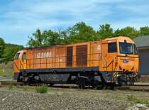 The MaK G 2000 BB asymmetric (Lok 43) of the KSW Kreisbahn Siegen-Wittgenstein (NVR-number: 92 80 1273 018-2 D-KSW) parked on 18.05.2012 in Siegen-Eintracht.