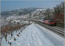 The SBB Re 460 094-6 with an IC to St-Gallen by Bossi�re.01.02.2012