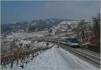 The SBB Re 460 002-9 with an IR to Luzern by Bossi�re.
01.02.2012