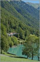 A SBB/ zb  De 110 with a Br�nig-Fast train Service from Luzern on the way to Interlaken Ost between Ebligen and Oberried. 
27.08.2012