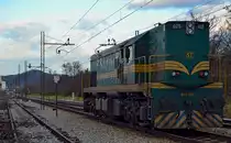 Diesel loc 644-025 is running through Maribor-Tabor on the way to Studenci station. /3.12.2012