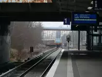 A S-Bahn-train Class 481 to Berlin Wartenberg is arriving Friedrichsfelde Ost. 1.12.2012