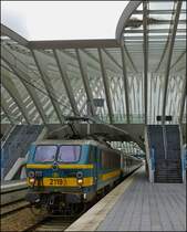 The HLE 2119 with M 4 cars is leaving the station Li�ge Guillemins on June 25th, 2012.