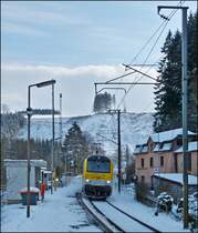 3011 is hauling the IR 112 Luxembourg City - Liers through the stop Maulusm�hle on February 9th, 2013.