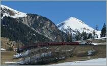 The RhB Ge 4/4 III with a RE from St Moritz to Chur on the top leavel over Bergn/Bravuogn.
16.03.2013