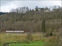 . The RE 3362 Wiltz - Kautenbach pictured while running along the castle of Wiltz on April 20th, 2012.