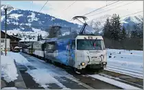 The MOB Ge 4/4 Serie 8000 with his Fast-Train-Service 3123 is arriving at Saanen. 
03.02.2014