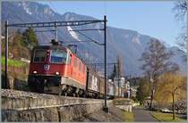 The SBB Re 4/4 II 11232 with a Cargo tran near Villeneuve. 
10.03.2014