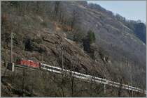 A Re 4/4 II wiht an IR in the  Biaschian  (Gotthard South Line)
03.04.2013