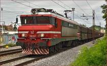Electric loc 363-014 pull freight train through Maribor-Tabor on the way to Koper port. /12.8.2014
