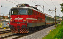 Electric loc 342-025 pull EC151 'Emona' through Maribor-Tabor on the way to Ljubljana. /3.9.2014