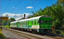 Multiple units 711-013 run through Maribor-Tabor on the way to Maribor station. /23.9.2014