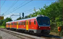Multiple units 713-104 run through Maribor-Tabor on the way to Maribor station. /28.8.2014
