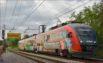 Multiple units 312-140 run through Maribor-Tabor on the way to Maribor station. /21.10.2014 