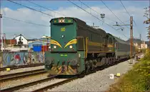 Diesel loc 664-120 pull MV247 'Citadella' through Maribor-Tabor on the way to Budapest. /11.11.2014