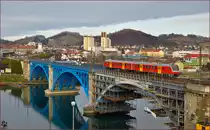 Multiple units 713-102 run over Drava Bridge on the way to Murska Sobota. /6.1.2015