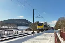 . 3013 is hauling the IC 112 Liers - Luxembourg City through the Woltz valley near Maulusm�hle on February 4th, 2015.