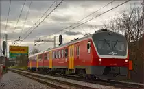 Multiple units 713-104 run through Maribor-Tabor on the way to Maribor station. /15.12.2014