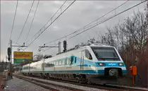 Multiple units 310-? run through Maribor-Tabor on the way to Maribor station. /19.1.2015