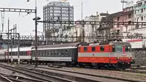 . The Swiss Express Re 4/4 II 11108 is entering into the station Basel SBB on August 4th, 2008.