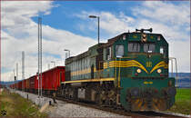 Diesel loc 664-113 pull freight train through Cirkovce-Polje on the way to Hodoš. /1.4.2015