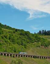 . Rhenus Veniro Stadler Regio-Shuttle RS1 650 351 is running on the slope viaduct near Pnderich on May 13th, 2015.
