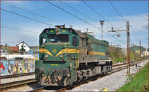 Diesel loc 664-108 run through Maribor-Tabor on the way to Studenci station. /16.4.2015
