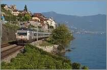 The SBB Re 460 041-7 red cross by St Saphorin.
31.08.2015