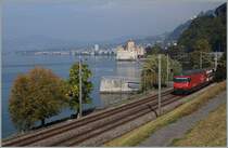 A SBB Re 460 with an IR to Brig by the Castle of Chillon.
02.10.2015