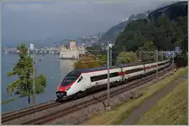 A SBB ETR 610 from Milano to Geneva by the Castle of Chillon.  
02.10.2015