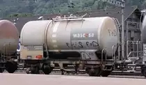 2-axle Tank Wagon Wascosa in a unit train made of A-VTG / CH-Mitrag / CH-Wascosa Funnel Flow Tank Wagons, on 17th August 2010 in station Erstfeld (CH)