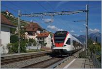 The SBB RABe 523 018 on the way to Allaman by St Saphorin.
26.08.2018