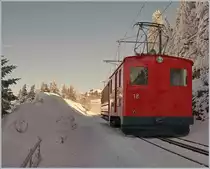The RB He 2/2 N° 18, made 1938 by SLM/BBC is approching Rigi Staffel.
24.02.2018