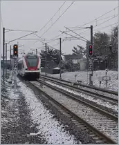 The SBB RABe 522 203 on the way to Biel/Bienne is leaving the new Grandvillars Station.
11.01.2019