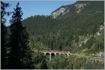 A RhB Ge 4/4 III wiht a Alubla fast Service near Filisur.
12.09.2016