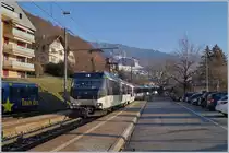 The MOB Ge 4/4 8001 on the way to Montreux is arriving with his MOB Panoramic Express in Chernex.

22.01.2019