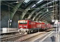 The DB 143 566-8 wiht an RB to Senfenberg by his stop in Berlin Ostbahnhof. 

Okt. 2003