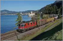 The SBB Re 420 298-2 with a Cargo train by the Castle of Chillon.

11.10.2019